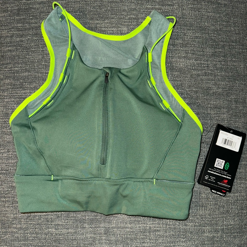 New Balance sports bra size XS color green NWT with some damages